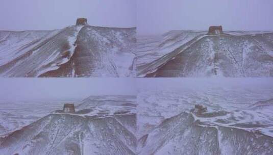 下雪天航拍山崖烽燧遗址高清在线视频素材下载
