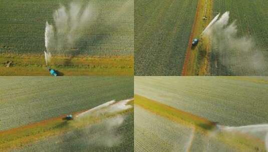 鸟瞰灌溉系统灌溉田地瞰灌溉在日落时灌溉高清在线视频素材下载