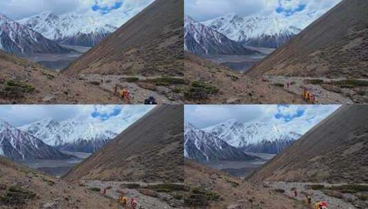 四川甘孜攀登那玛峰的登山者徒步进山高清在线视频素材下载