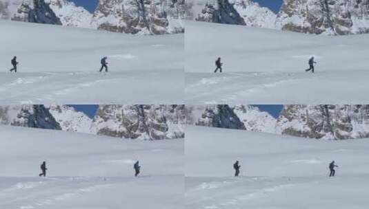 奥地利明亮的冬日，人们在蒂罗尔阿尔卑斯山的深雪中滑雪——静态拍摄高清在线视频素材下载