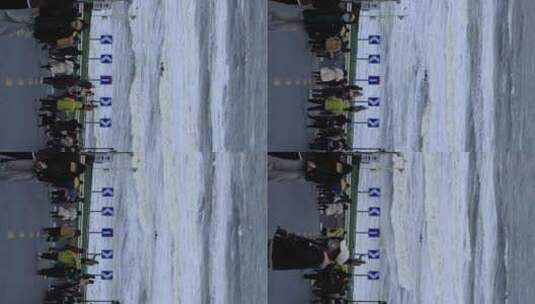 威海市国际海水浴场火炬八街海浪与打卡游客高清在线视频素材下载
