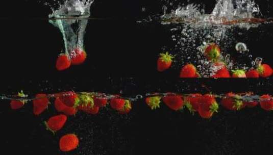 草莓掉入水中溅起水花的瞬间高清在线视频素材下载