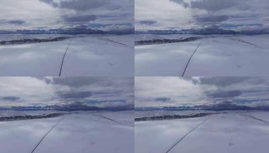 冬季新疆天山阿勒泰安集海雪山公路雪原云朵高清在线视频素材下载