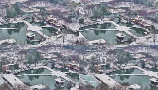 航拍瘦西湖景区园林大明寺观音山宋夹城雪景高清在线视频素材下载