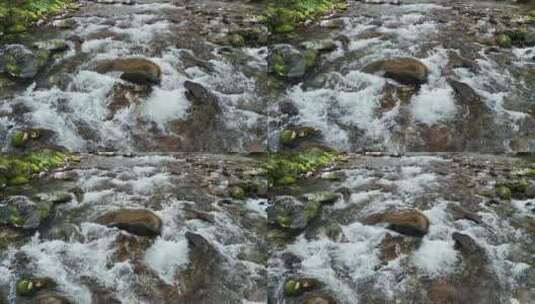 俯拍石头水花流水清澈溪流高清在线视频素材下载
