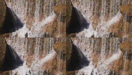 慢镜头升格瀑布水流冲击岩石高清在线视频素材下载