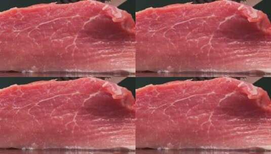 猪肉切开刀划过新鲜猪肉食材特写高清在线视频素材下载