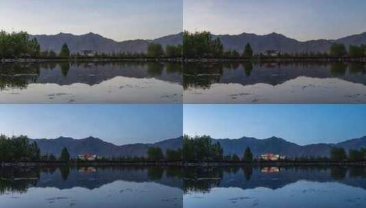 西藏拉萨布达拉宫地标宫殿晨雾日出延时高清在线视频素材下载