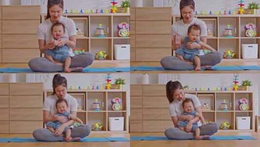 亚洲妈妈做瑜伽运动平衡身体与可爱的婴儿婴高清在线视频素材下载