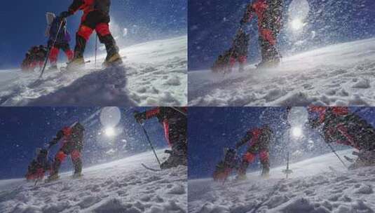 风雪中攀登慕士塔格峰雪山的登山队队员高清在线视频素材下载