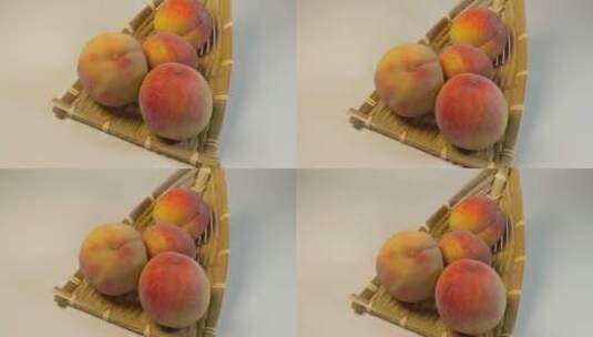 白底滑轮白花桃桃子高清在线视频素材下载