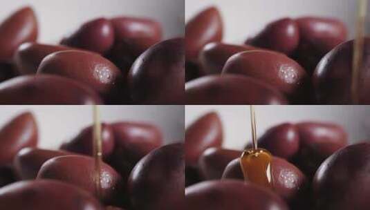 橄榄油淋在樱桃上高清在线视频素材下载