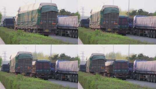 疫情期间排队在高速公路的货运车辆高清在线视频素材下载