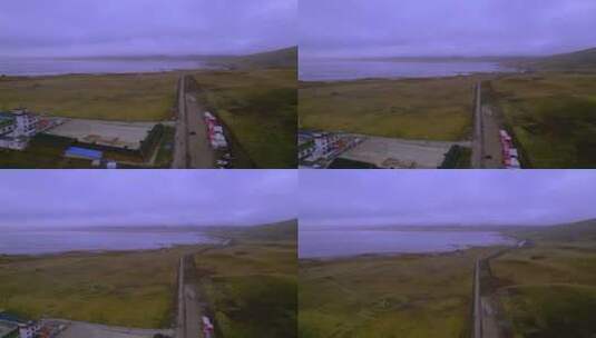 甘南尕海湖草原湿地云雾与公路航拍风光高清在线视频素材下载