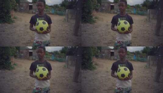 玩足球的男孩肖像特写镜头高清在线视频素材下载