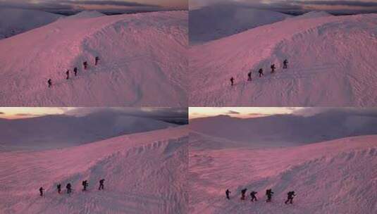 徒步者步行到雪山顶高清在线视频素材下载