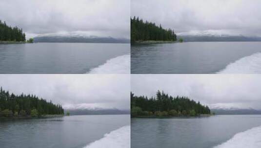 快艇在湖泊里行驶激起的水花高清在线视频素材下载