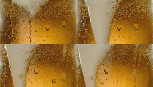 玻璃杯壁啤酒泡沫水珠流淌高清在线视频素材下载