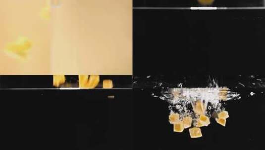 菠萝凤梨落水掉入水中慢动作升格实拍高清在线视频素材下载