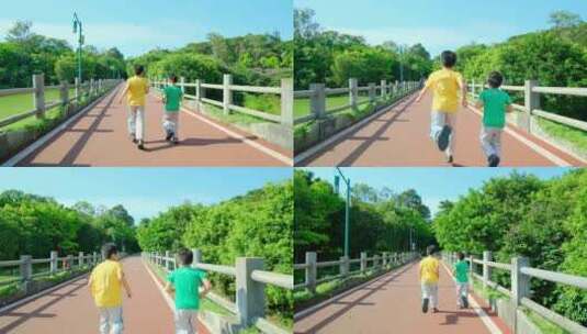 两个小孩在公园跑道跑步过桥 向前冲高清在线视频素材下载