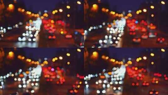 中国北京夜晚城市道路虚化光斑汽车交通景观高清在线视频素材下载