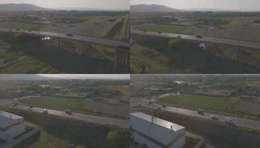 一架越野车驶过铁路桥的空中跟踪照片高清在线视频素材下载