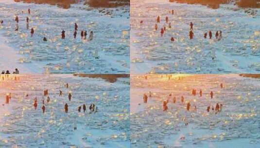 中国黑龙江哈尔滨冰块钻石海日落航拍高清在线视频素材下载