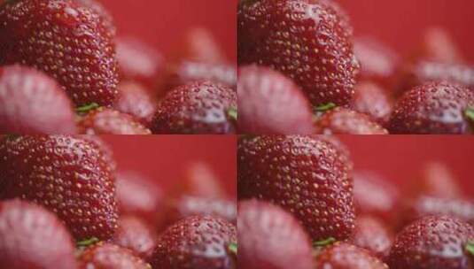 草莓上水滴的慢镜头特写高清在线视频素材下载