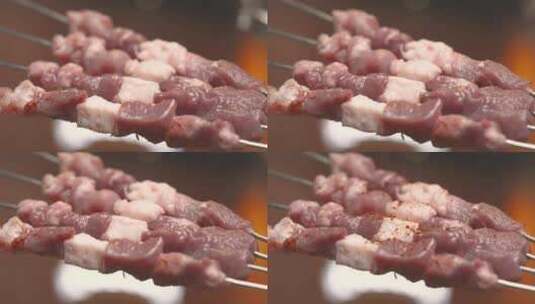 羊肉串 撒孜然 撒料 食欲画面 烧烤高清在线视频素材下载