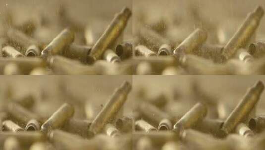 沙粒掉落在子弹壳上高清在线视频素材下载