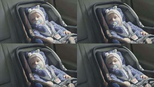 婴儿坐在汽车座椅里旅行高清在线视频素材下载