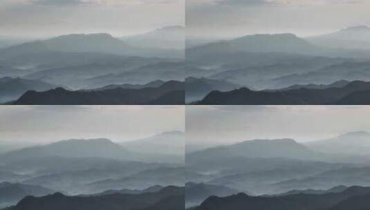 航拍山脉里的日出平流雾水墨画高清在线视频素材下载
