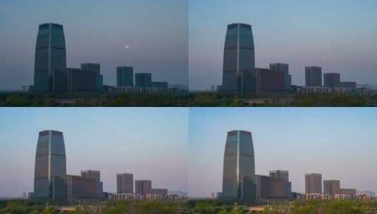 城市CBD月亮落下阳光照耀延时高清在线视频素材下载