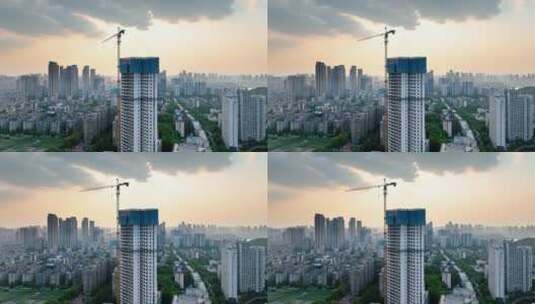 4K武汉房地产高楼施工转动中的塔吊高清在线视频素材下载