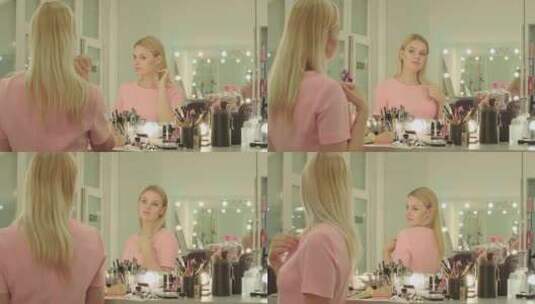美容院里女孩在照镜子高清在线视频素材下载