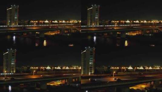 航拍上海夜晚城市轨道地铁穿行城市之中高清在线视频素材下载