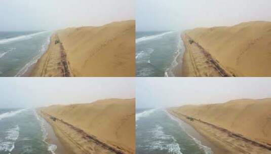 纳米布沙漠边缘海滩上汽车的宽螺旋照片高清在线视频素材下载