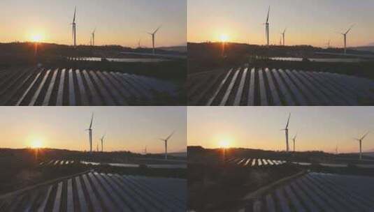 日出日落 太阳能光伏板 风力风车发电站航拍高清在线视频素材下载