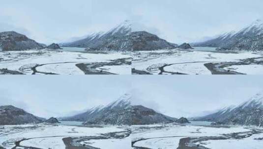 西藏昌都然乌湖和雪山雪地森林湖泊雪景航拍高清在线视频素材下载