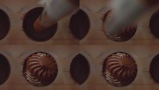 把巧克力挤进巧克力模具高清在线视频素材下载