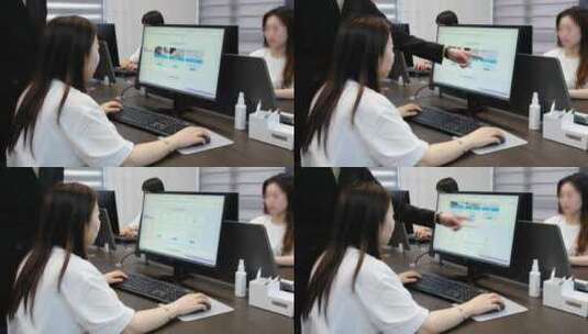女生坐在电脑前领导指导工作高清在线视频素材下载