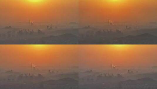 航拍徐州城市日出朝阳,平流雾工厂烟囱高清在线视频素材下载