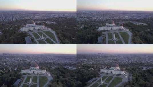 格里菲斯天文台的空中轨道和背景中的洛杉矶高清在线视频素材下载