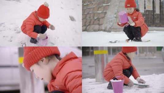 小女孩儿童雪地玩雪铲雪红帽子红色棉袄高清在线视频素材下载