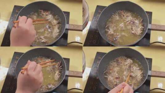 螃蟹裹淀粉下油锅炸香辣蟹炸大闸蟹高清在线视频素材下载