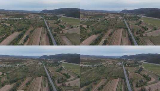 航拍乡村田野与道路景观高清在线视频素材下载