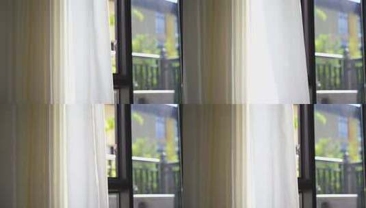 风吹窗帘窗户白色窗帘飘动阳光透过白色窗帘高清在线视频素材下载