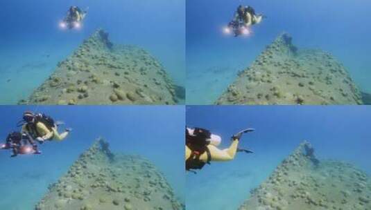 水肺潜水员在海底潜水高清在线视频素材下载