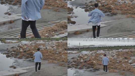 岸边散步的少年高清在线视频素材下载