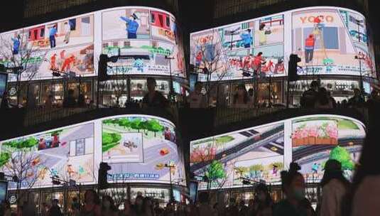 夜晚街道上的大型宣传广告牌高清在线视频素材下载